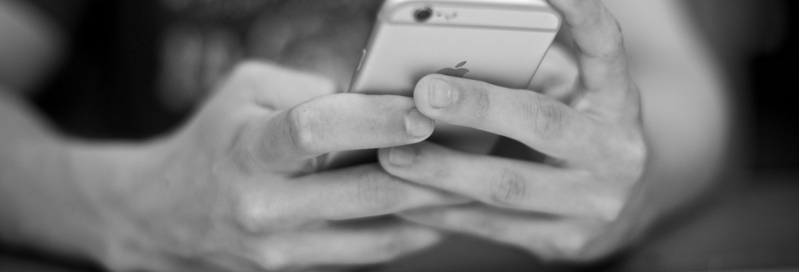 Hands holding a phone